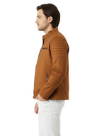 Side view of a man wearing a brown suede faux leather jacket, showcasing its stylish design and zipper detail.